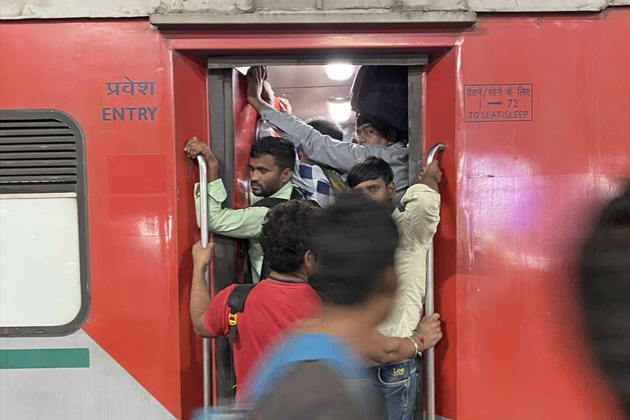Man slams Indian Railways after overcrowded train prevents him from travelling home despite having AC tickets.