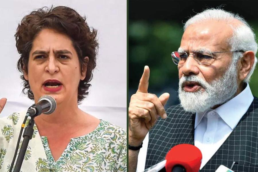 An image of Priyanka Gandhi and PM Narendra Modi