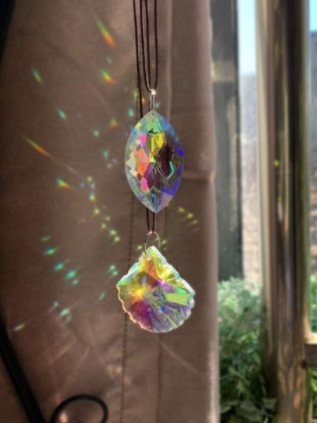 Know the auspicious benefits of hanging ctystal balls in house dgtl