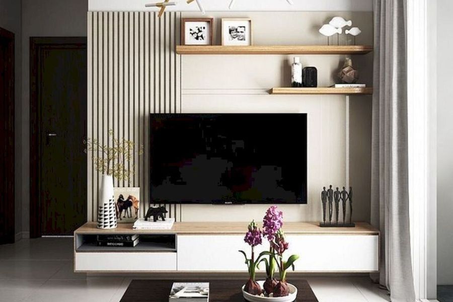 বসার ঘরের টিভি ইউনিট সাজিয়ে নিন। ছোট ছোট শো পিস, যা সারা বছর আপনার ঘরে রাখেন না, তা বের করে সাজিয়ে নিন। এমন কি ছবির ফ্রেমের ছবিও বদলে নিন। উৎসবের আমেজে নিজেদের নতুন কোনও মুহূর্ত ফ্রেমবন্দি করে রাখুন টিভি ইউনিটের পাশে। 