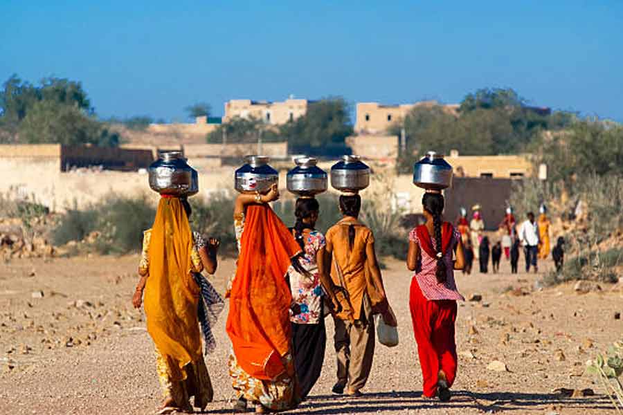 Woman travelling far to collect water