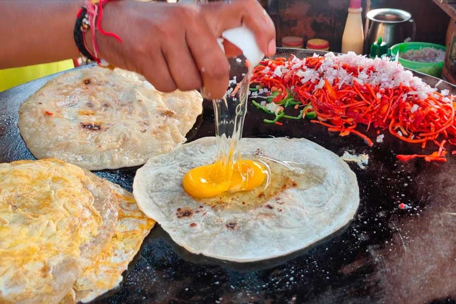 Where you can get lip smacking food near Suruchi Sangha Durga Puja Pandal hopping.