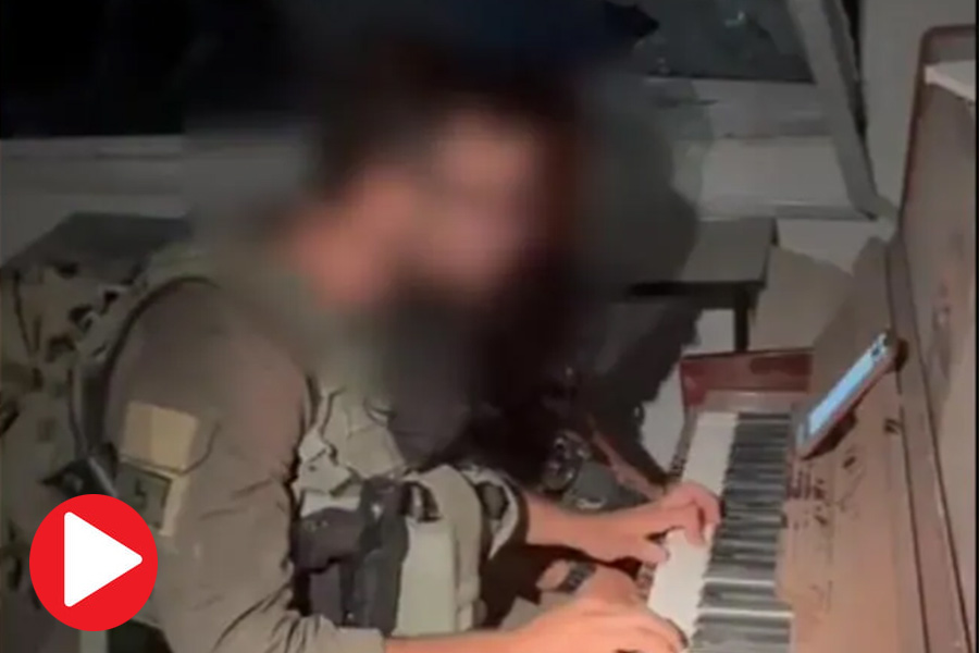 Viral video of Israeli soldier singing national anthem in house destroyed in war