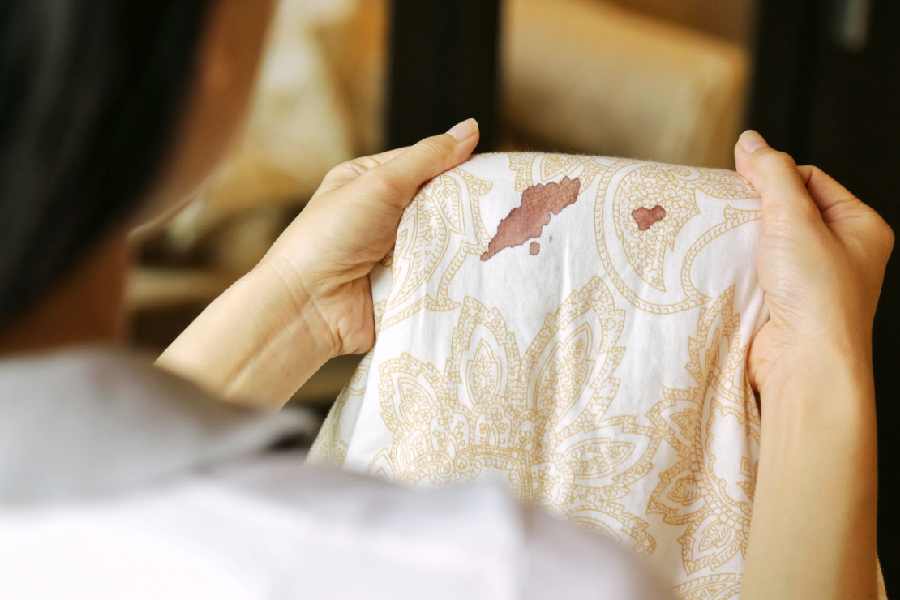 What causes spotting before a period.