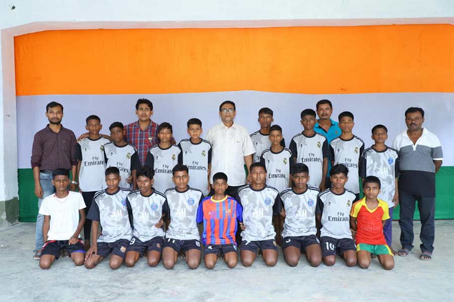 Teachers of Kunoir High School  of Raiganj happy for the achievement of their student at sports field