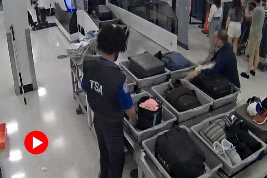 Airport officers allegedly stole money from bags of passengers.