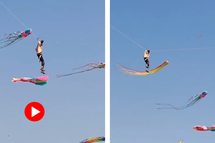 Viral Video of man flying with a kite