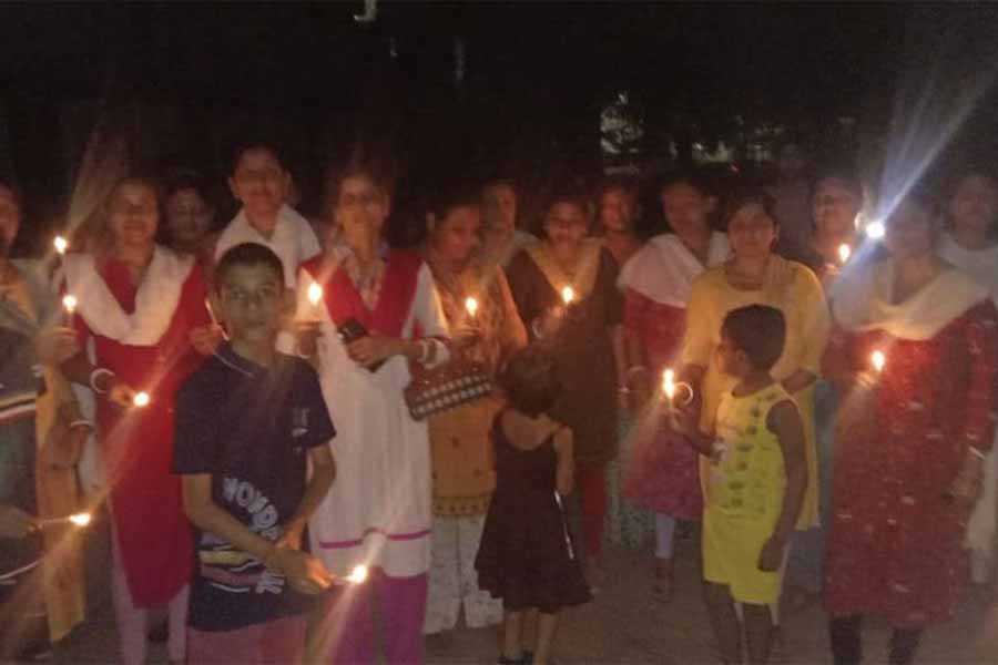 Residents out for [rotest against frequent power cut at City Center Housing Colony of Durgapur