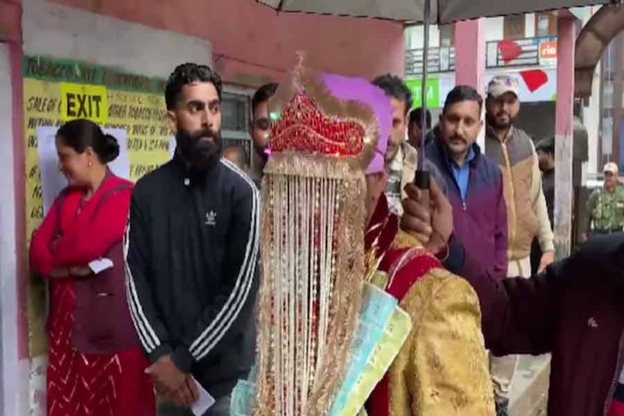 Groom arrives at polling station with band party in Jammu and Kashmir to cast his vote