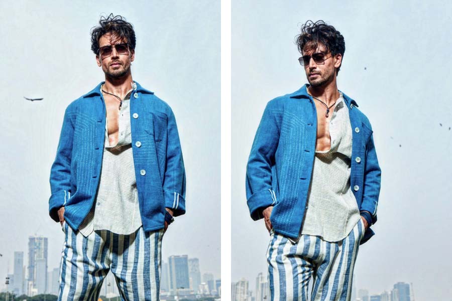 কেবল নাচই নয়,  টাইগার শ্রফের সাজেও মুগ্ধ হন বহু নারী। ইনস্টাগ্রামের ফোটোশুটে টাইগারের পরনে ছিল সুতির ‘ডব্‌ল লেয়ার’  শার্ট। সঙ্গে সুতির ঢিলেঢালা ট্রাউজ়ার্স। গরমের দিনে এমন পোশাকের সঙ্গে রোদচশমা আর গলায় একটা চেন,  ব্যস আর কী চাই! মহিলাদের নজরে আসতে এই সাজের তুলনা নেই। 