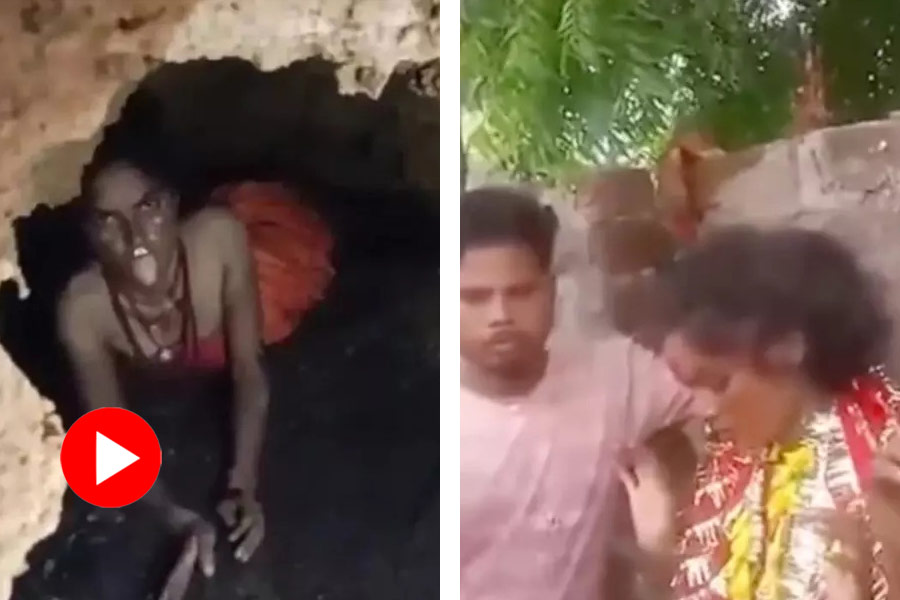 Viral Video of Jharkhand woman who was missing found in a cave and pretending to be a snake