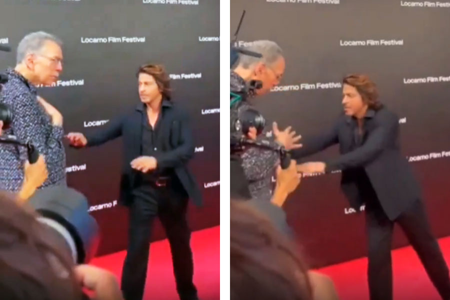 Shah Rukh Khan pushed an old an away on the red carpet at Locarno Film Festival