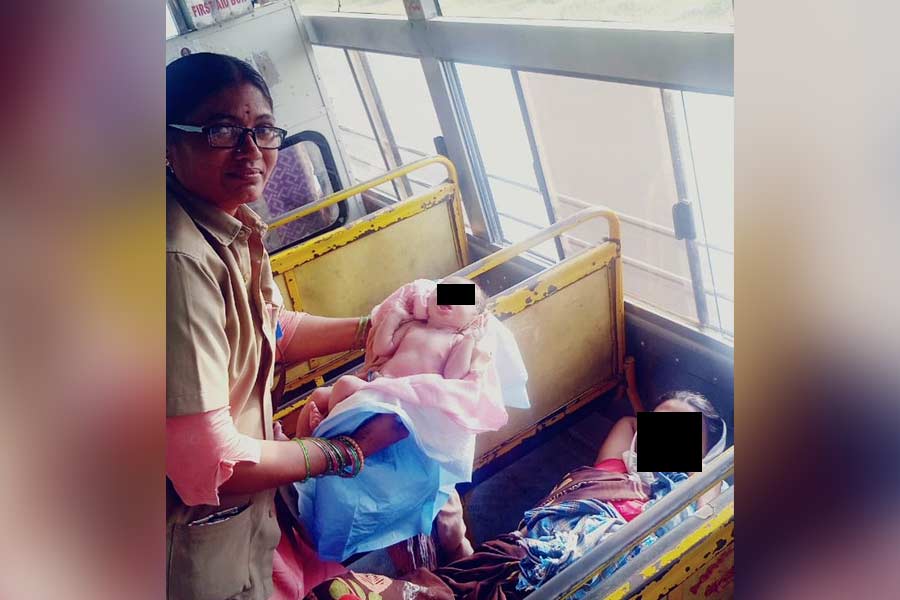 Woman goes into labour in bus in telengana conductor helps to deliver baby