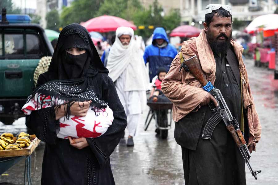 Taliban bans women from looking at stranger men and speaking loudly