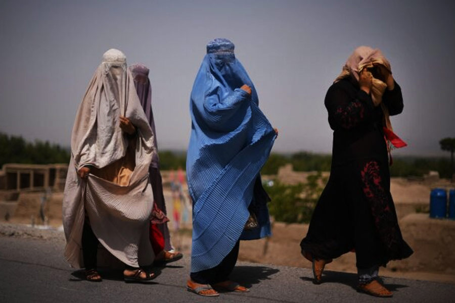 Taliban bans women from looking at stranger men and speaking loudly