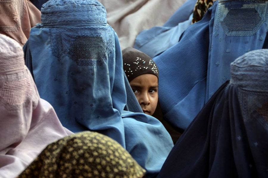Taliban bans women from looking at stranger men and speaking loudly
