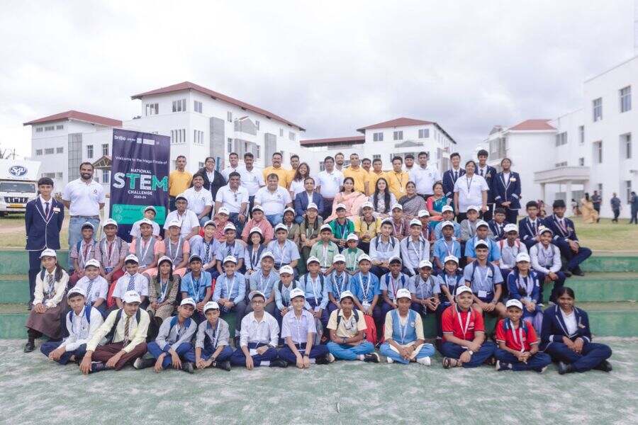 Competitors with officials of the organizing organization.