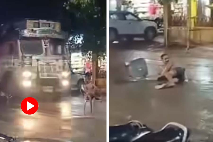 Man sat on a chair in the middle of the road in Uttar Pradesh