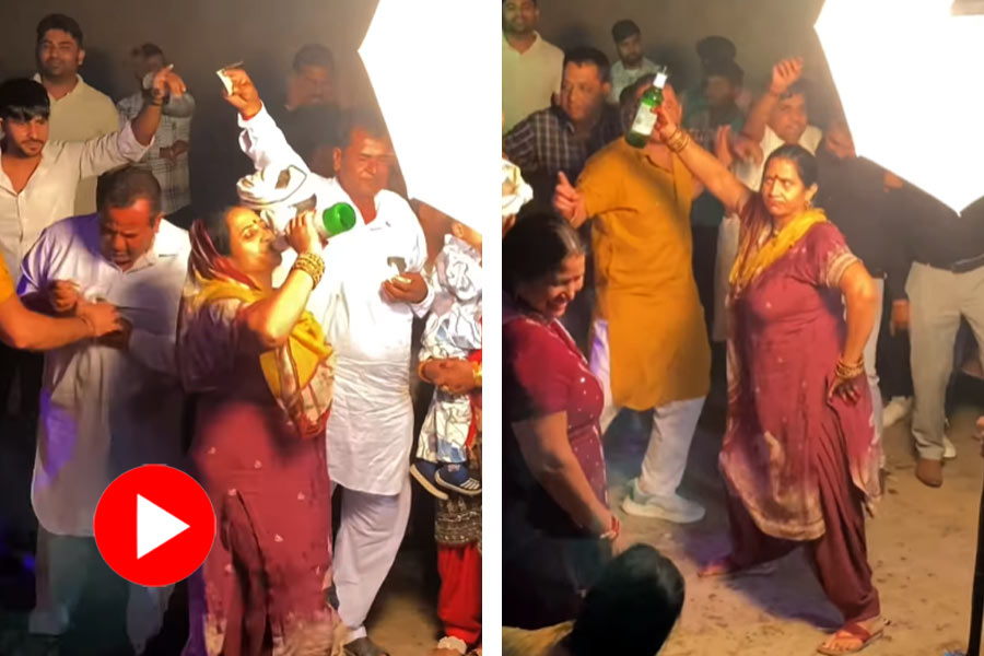 Woman dances with a bottle of alcohol, video went viral