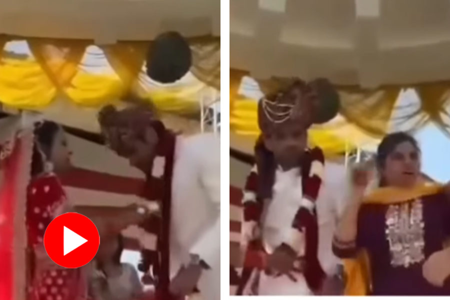 Groom’s ex-girlfriend crashes wedding and thrashes him while the bride watches the whole thing in shock, video goes viral