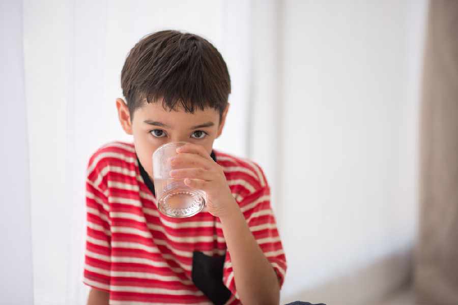 Five useful tricks to get kids to drink more water