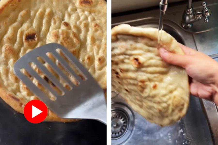 Woman washes Naan under running water to keep it soft