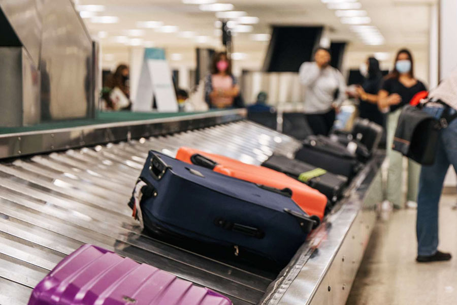 A photograph of baggage in airport.