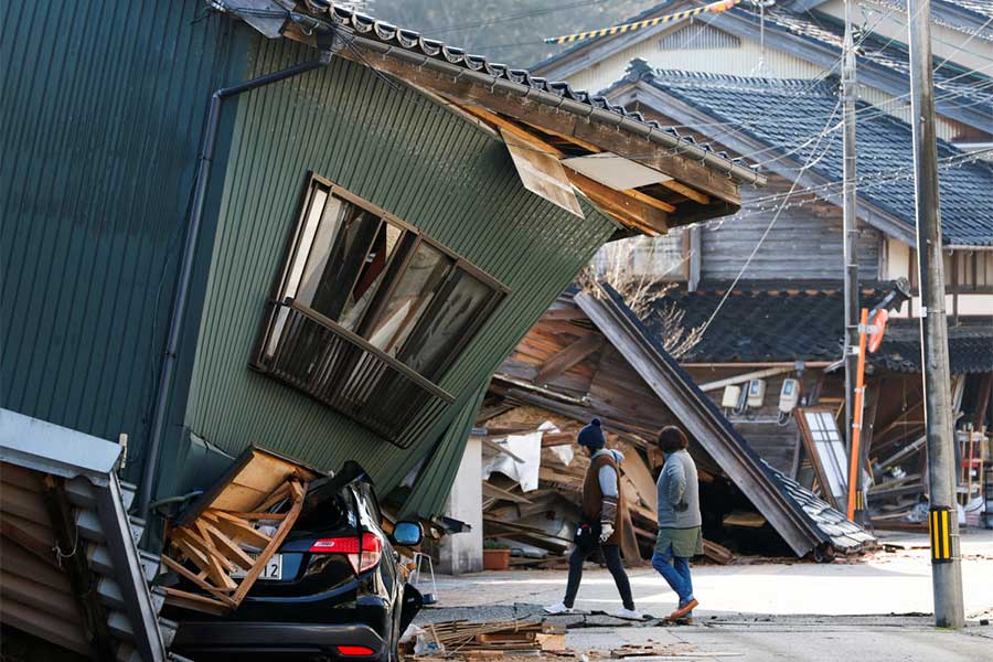 At least eight dead and several feared trapped as 155 earthquakes hit Japan in a day