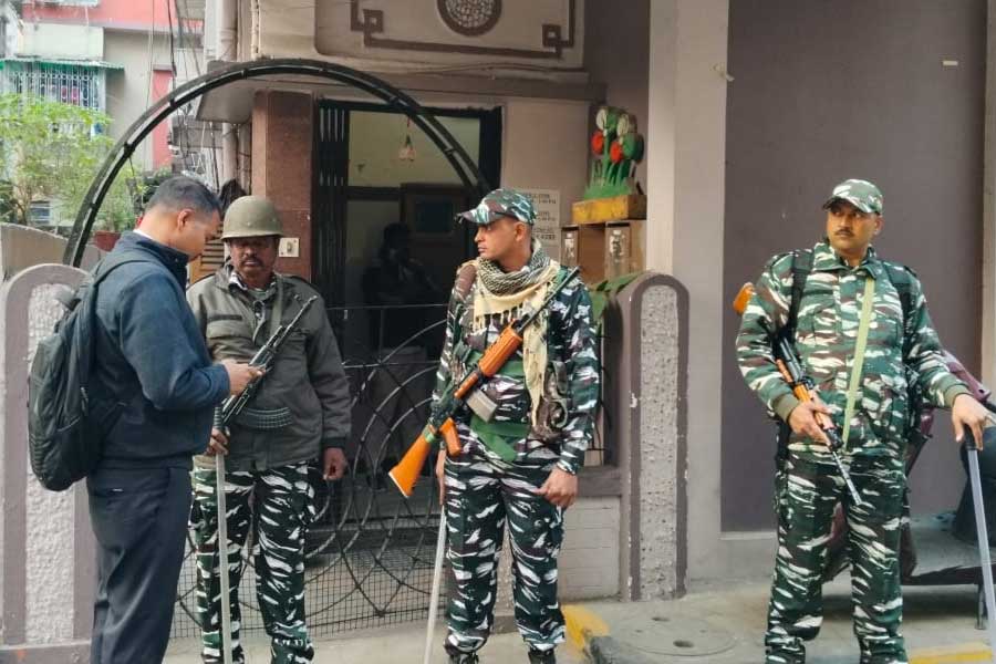 Crpf route march in Sreebhumi while searching the house of Fire Minister Sujit Bose