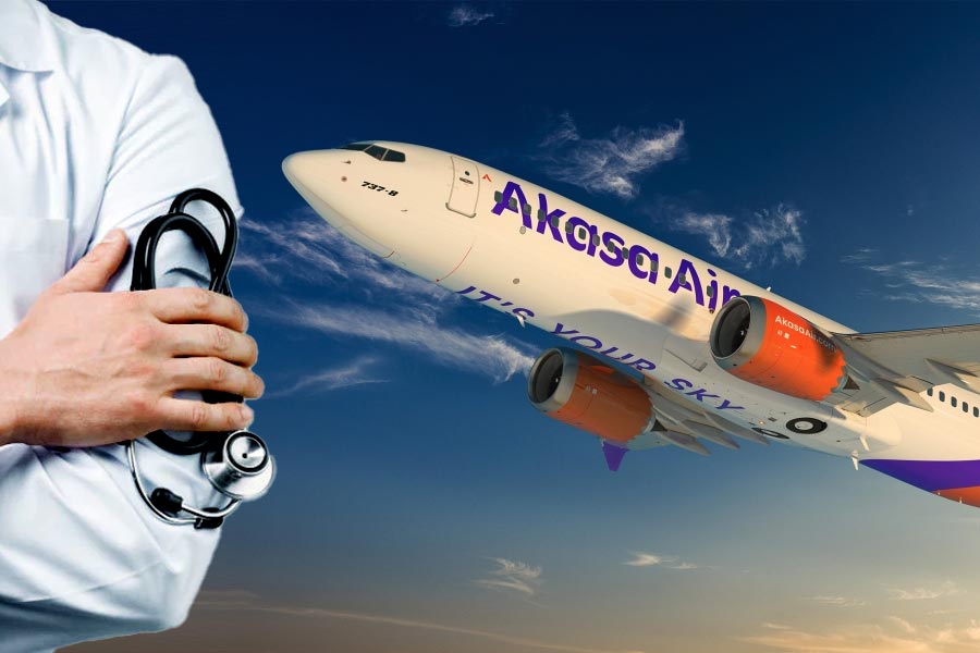 Kochi Doctor saved life of a Passenger in flight.