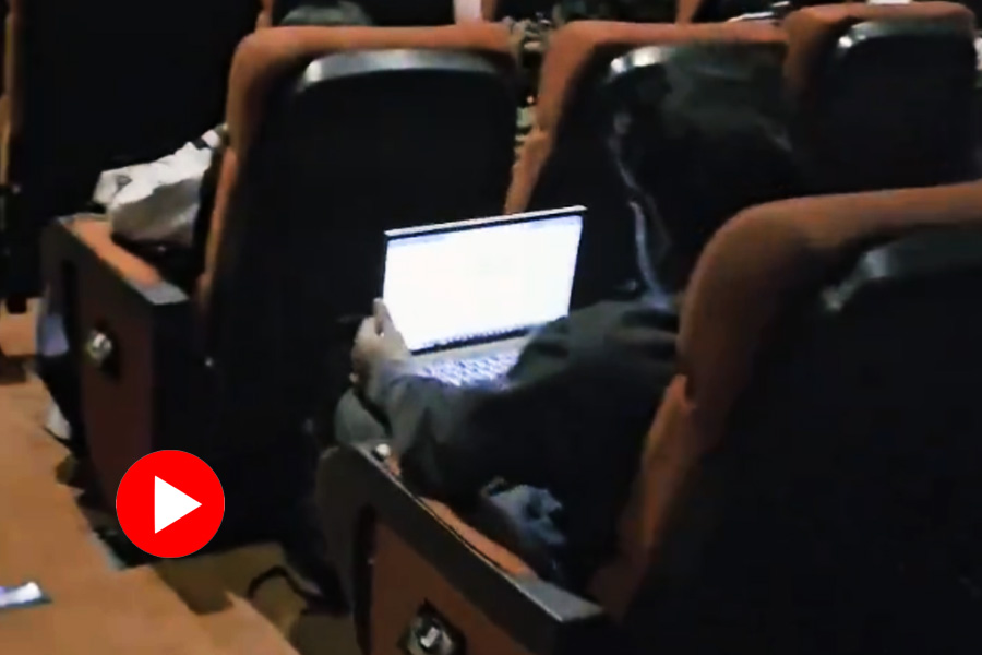 Man seen working on laptop in a movie theater video went viral.