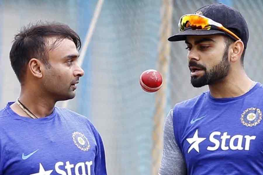 Amit Mishra and Virat Kohli