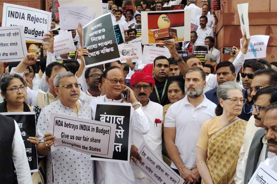 Opposition Alliance INDIA leaders protest outside parliament on Wednesday against Union Budget presented last day