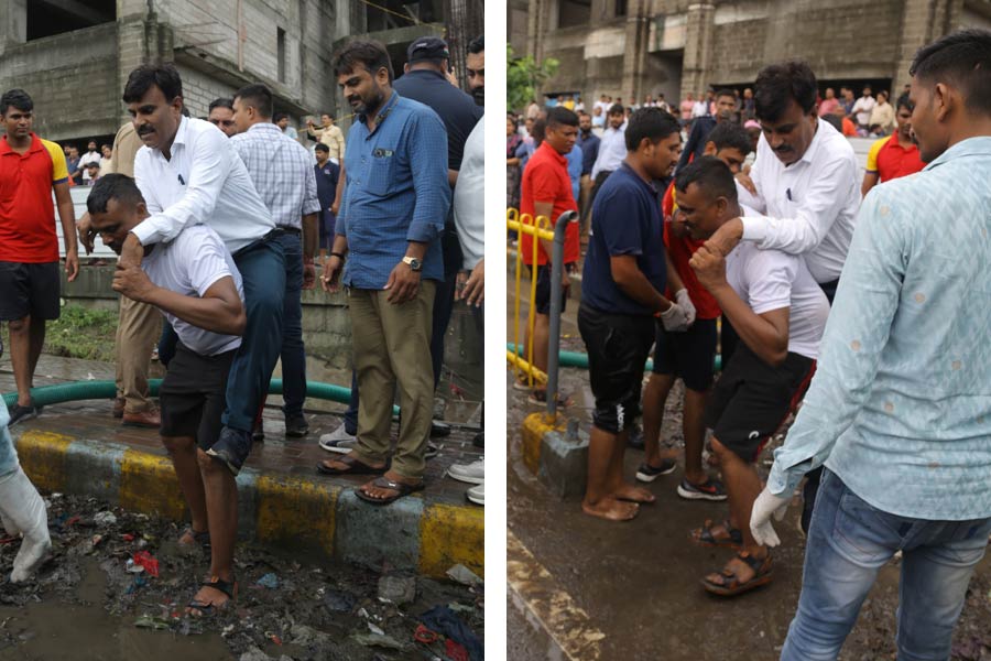 Photo of Surat Deputy Mayor carried by Fire Department official in muddy road goes viral