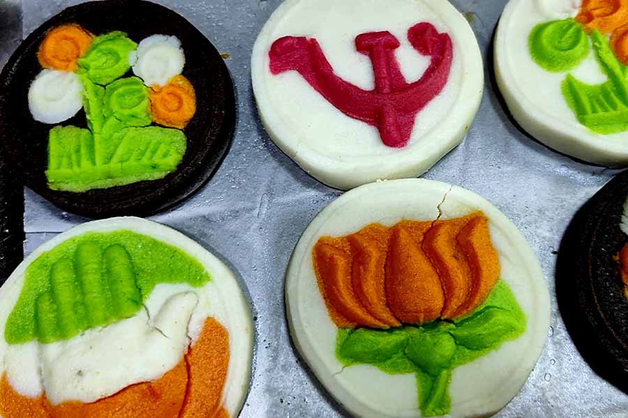 Sweets with symbols of various political parties are being sold in South Kolkata shop dgtl