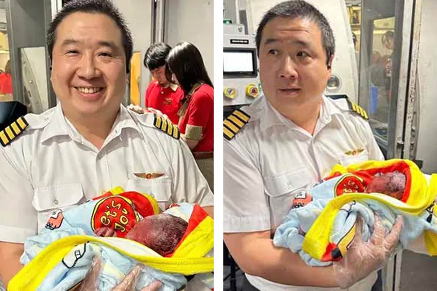 During flight to thailand, pilot helps to deliver baby in the air