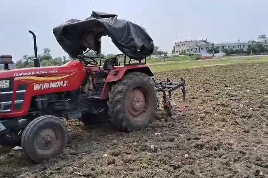 Tractor in a field where PM Narendra Modi will do a rally in north 24 pargana’s jagaddal dgtld