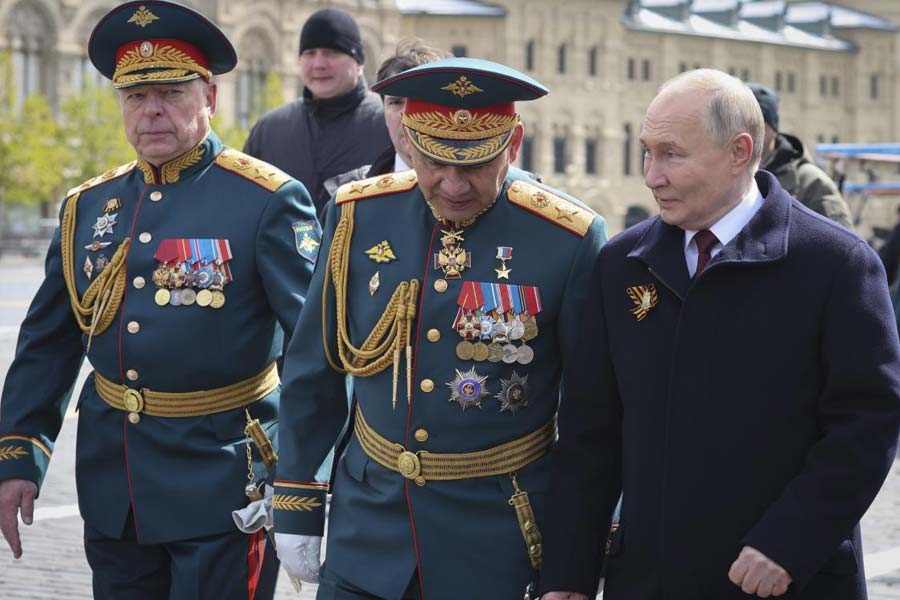 Vladimir Putin replaces his defence minister in surprise reshuffle