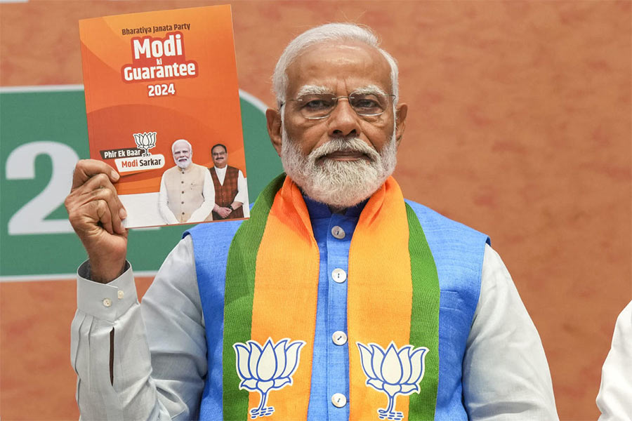 Prime Minister Narendra Modi releases the BJP\\\\\\\'s election manifesto ‘Sankalp Patra’ at the party headquarters, in New Delhi