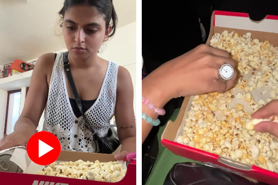 Woman enters cinema hall with home cooked popcorn in shoebox, video goes