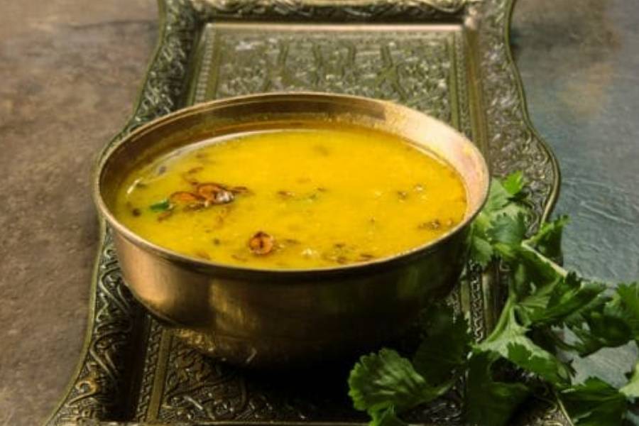 What are the health risks of overeating Arhar dal