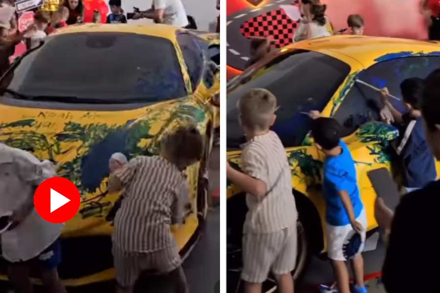 Toddlers use 500K dollars Ferrari as birthday party prop, paint it with watercolours in Dubai