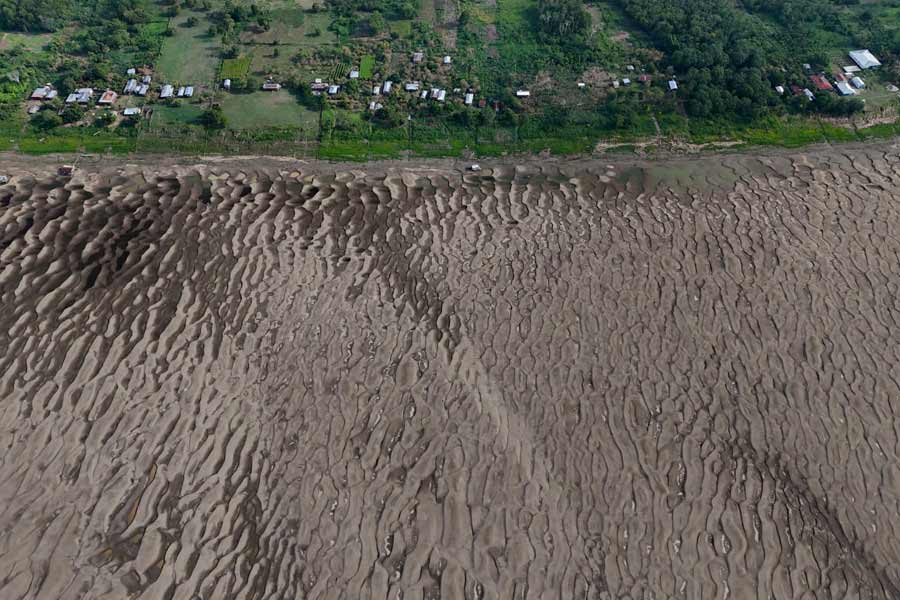 Amazon tributary Solimoes depth drops record low due to severe drought in Brazil 