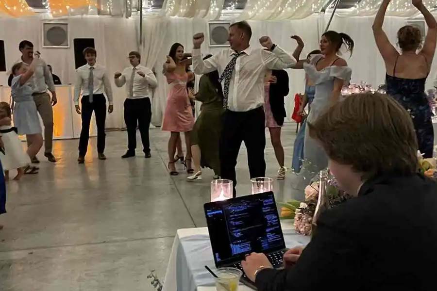 Groom was photographed while working at his own wedding day