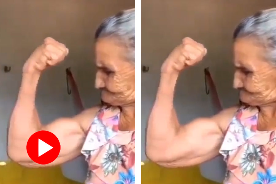 Elderly woman showing her biceps on video