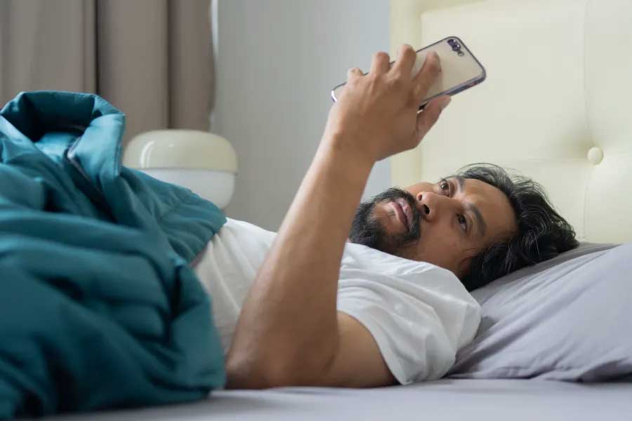 Checking your phone first thing in the morning may be harming your mental and physical health