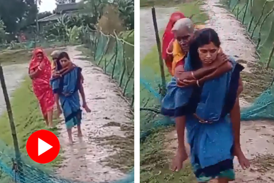 Odisha Asha worker carries elderly woman on shoulders to safe place before Cyclone dana approaches, video goes viral