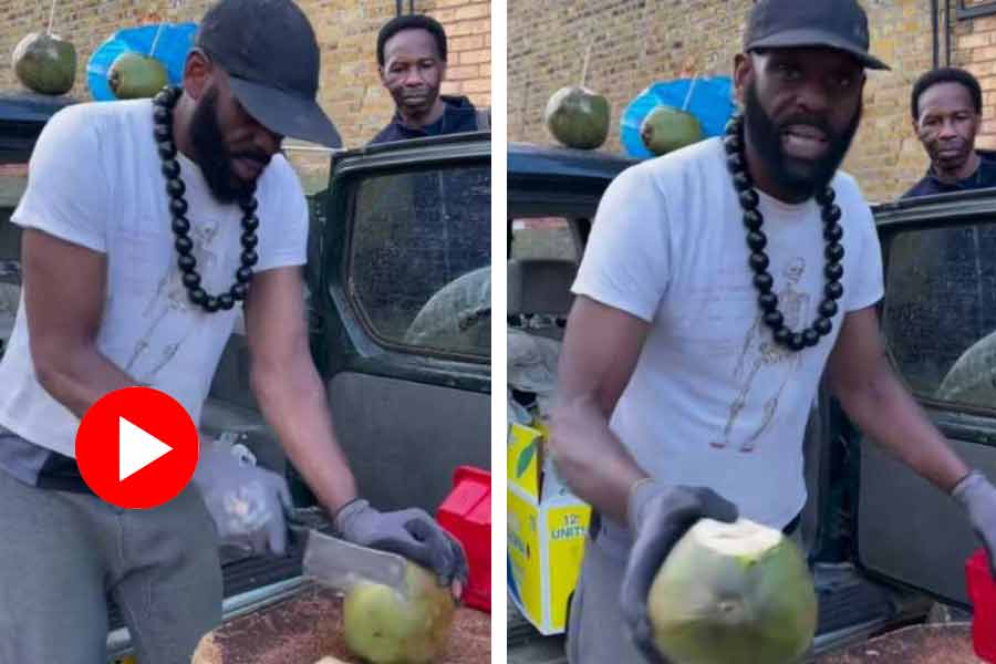 The vendor was selling coconut water in unique style