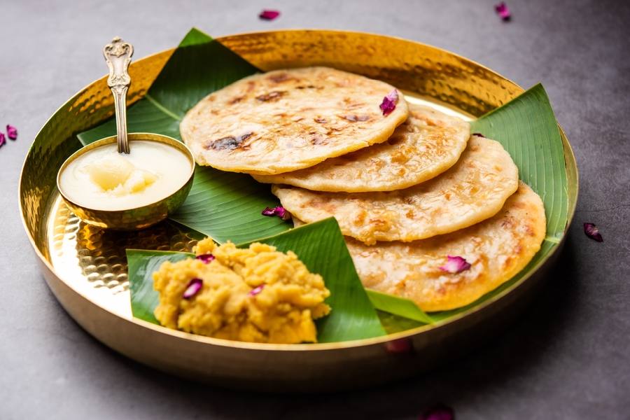 ভোগের থালা পুরান পোলি ছাড়া অসম্পূর্ণ।