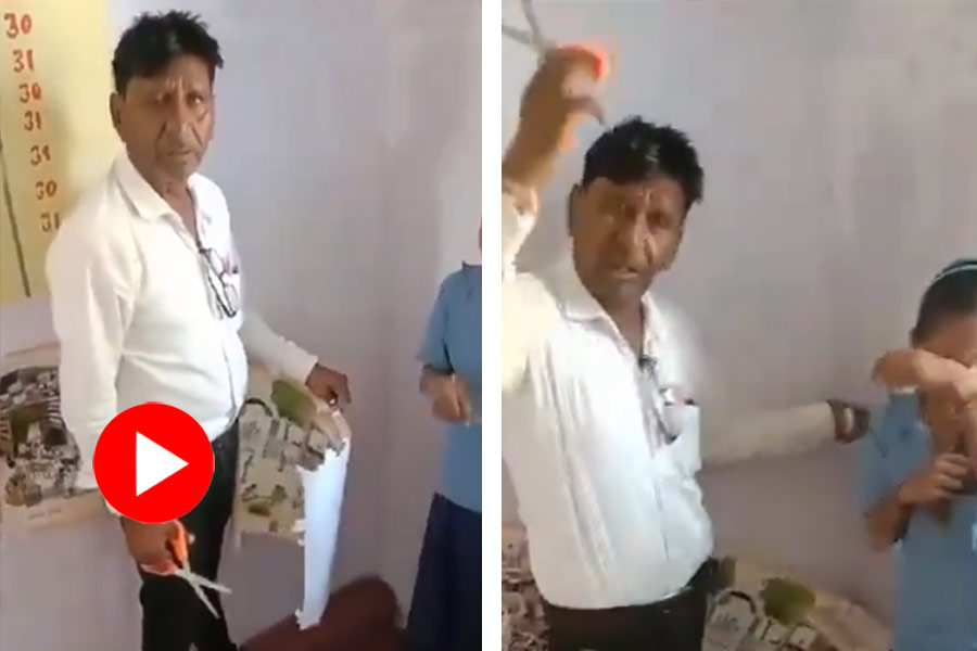 Viral Video of teacher cutting hair of student